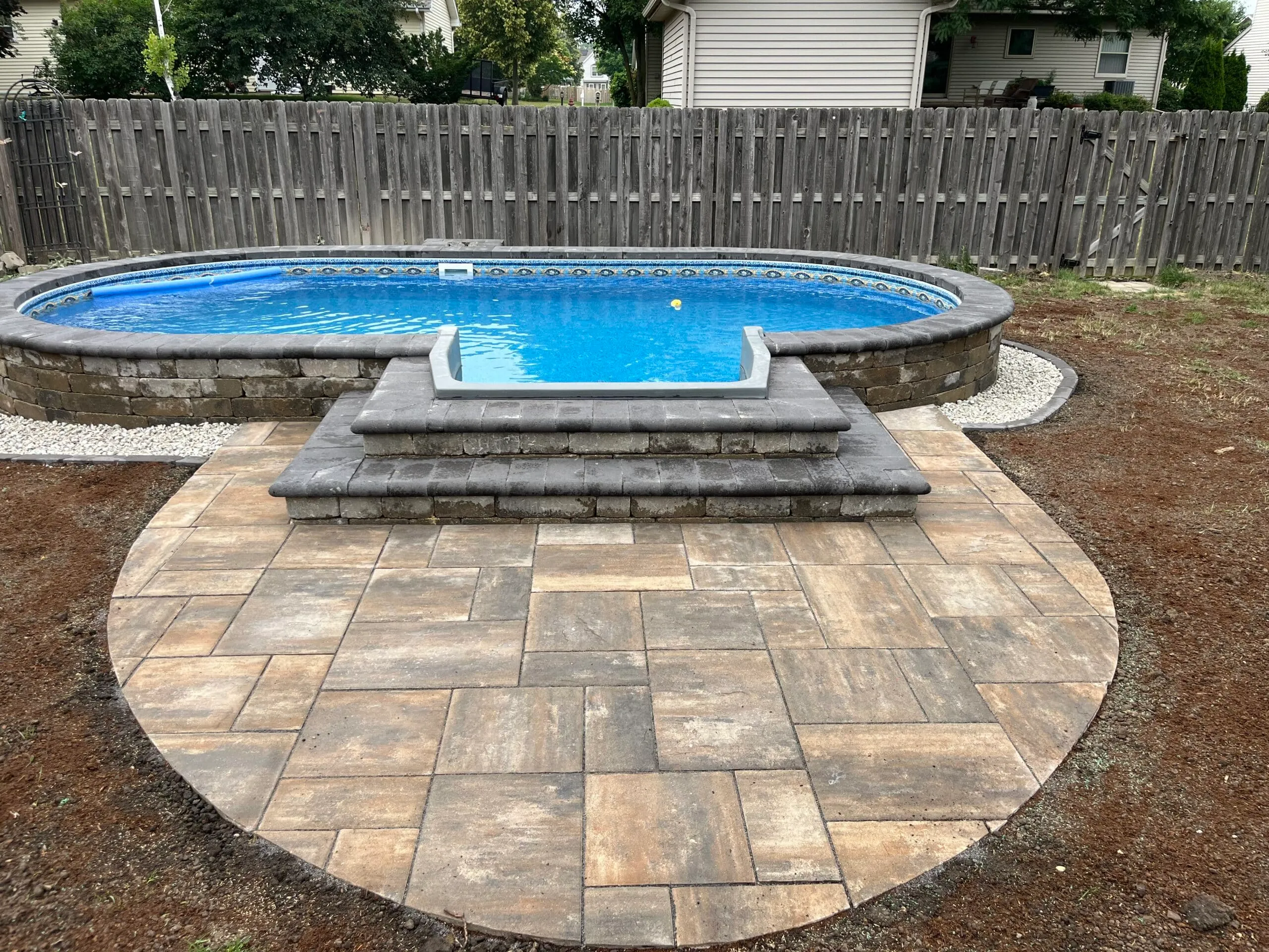 Paver pool deck with spa surround