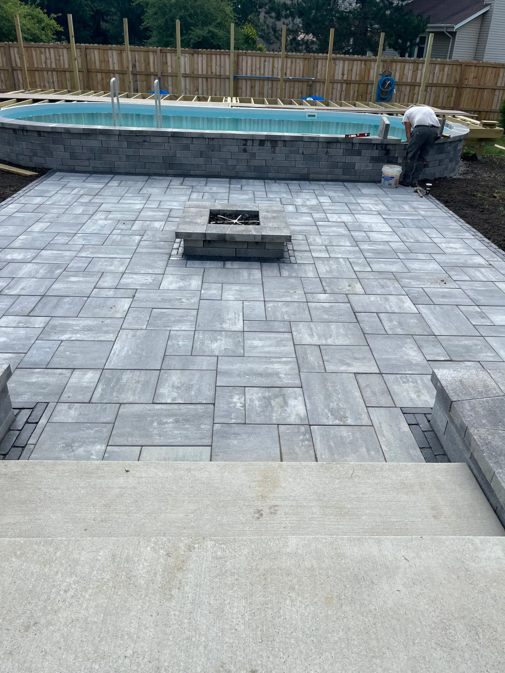 Large paver patio with fire pit