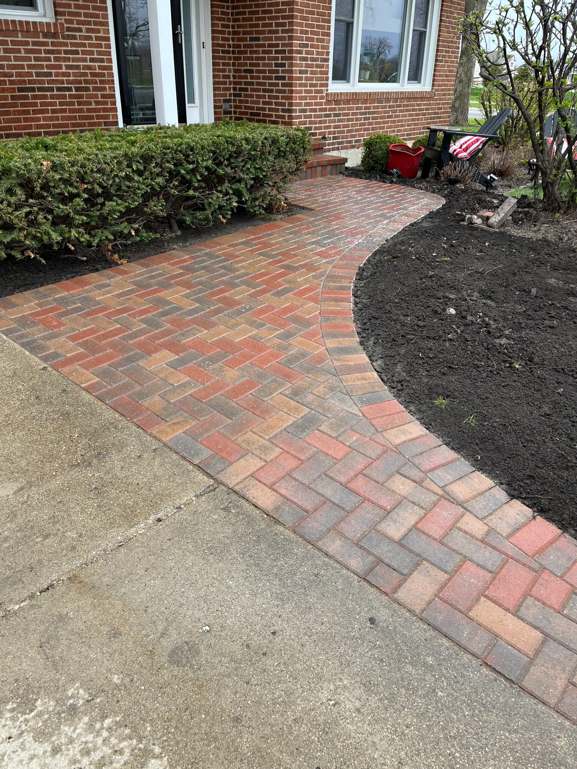 Herringbone clay paver walkway