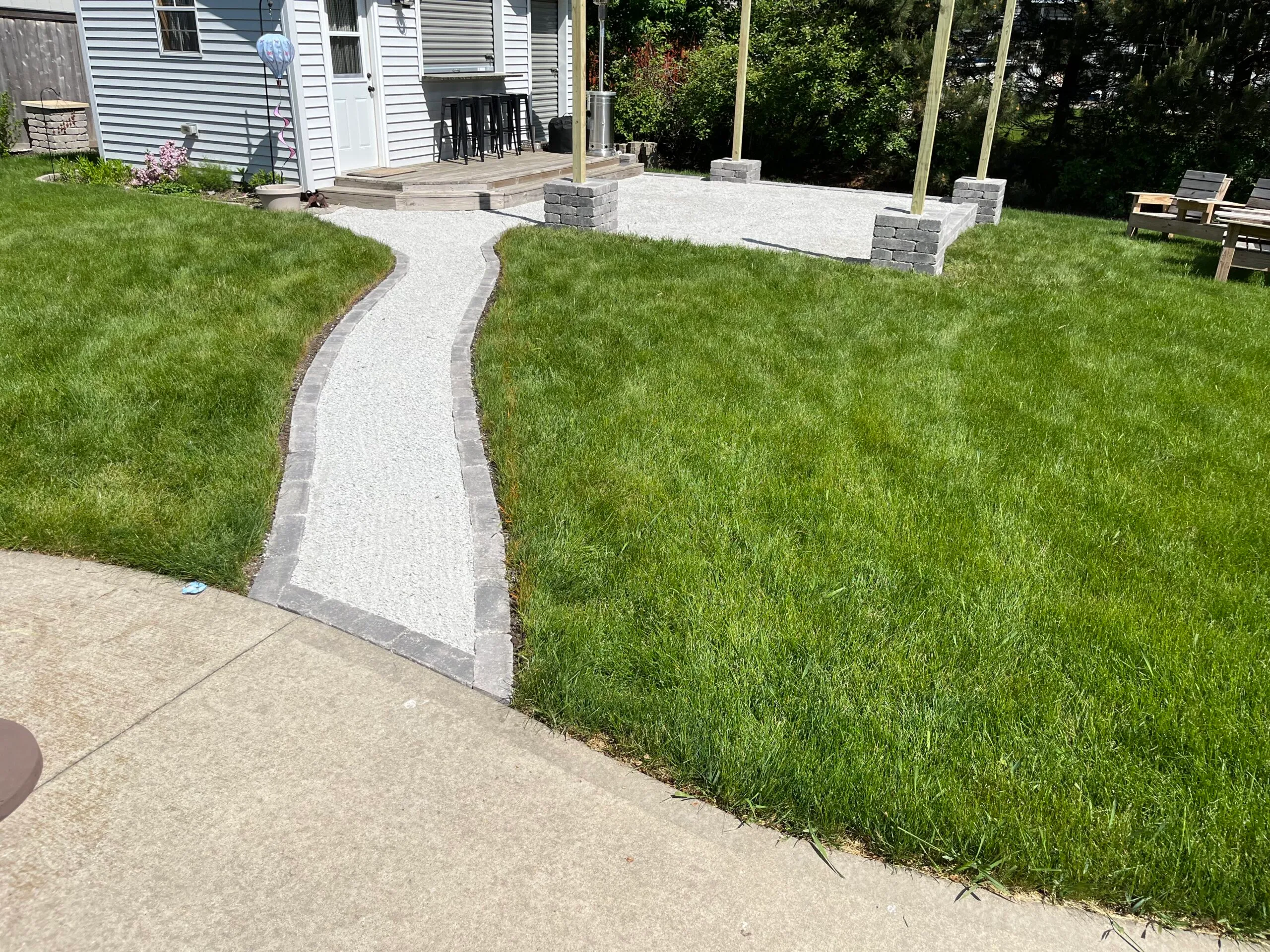 Walkway and steps across front lawn